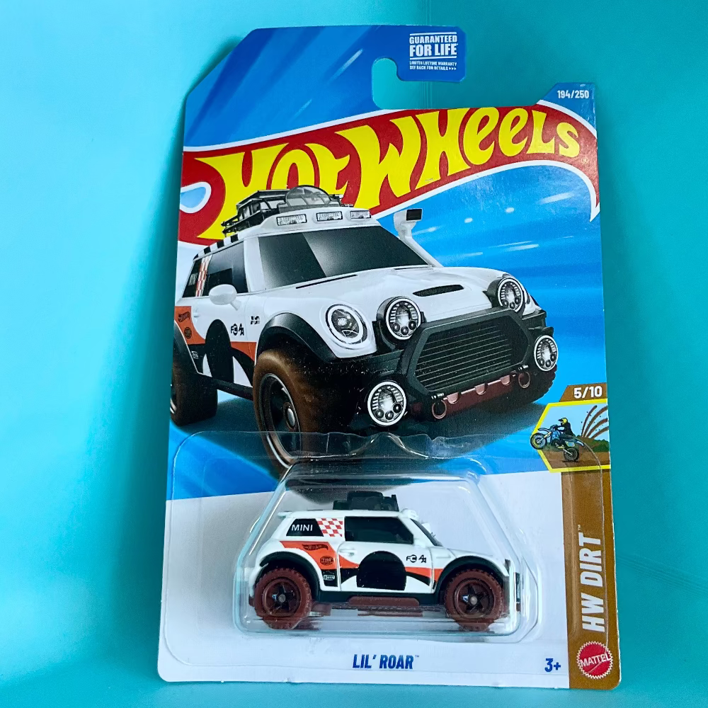 A Hot Wheels die-cast toy car in its original blister packaging, featuring the 'Lil' Roar' model. The cardback displays the Hot Wheels logo and a graphic of the white and orange vehicle, set against a bright turquoise background.