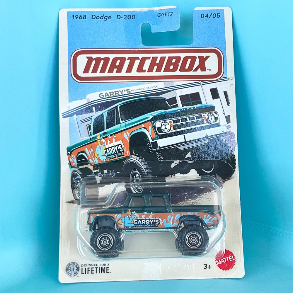 A Matchbox die-cast toy car in its original blister pack card, featuring a 1968 Dodge D-200 with 'Crazy Dog' graphics, set against a bright cyan background.