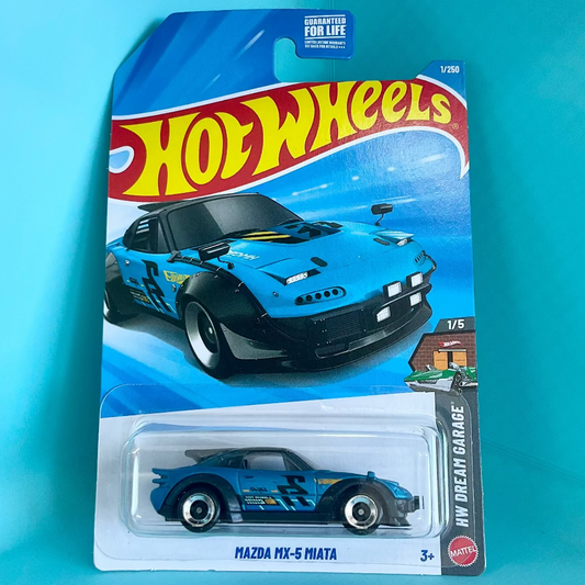 A Hot Wheels Mazda MX-5 Miata die-cast toy car in its original blister card packaging, set against a solid turquoise background.