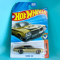 A Hot Wheels '70 Buick GSX die-cast toy car in its original blister card packaging, displayed against a bright turquoise background.