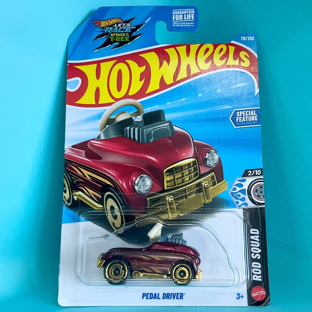 A Hot Wheels toy car in its original blister card packaging, featuring the 'Rod Squad Pedal Driver' model. The packaging displays a red and gold classic car illustration above the actual small red and gold toy car, set against a bright turquoise background.
