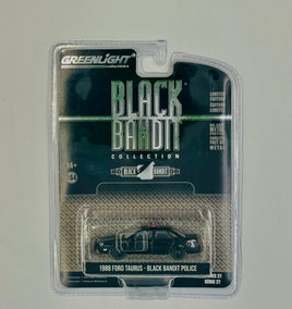 Greenlight - 1988 Ford Taurus - Black Bandit Police