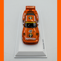 Tarmac Works Mini Champs - Porsche 935 Max Moritz Jagermeister Manfred Schurti 1977 Winner - 1/64 scale